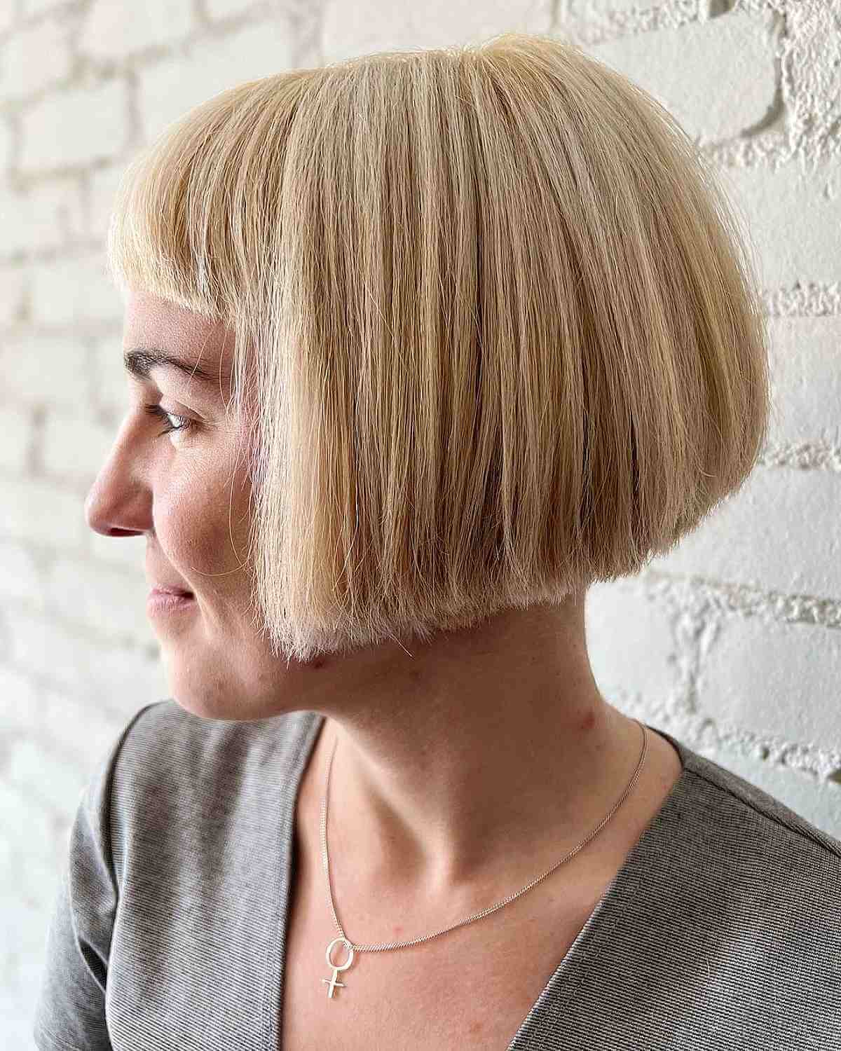 Cool Blonde Jaw-Length Bob with Micro Bangs