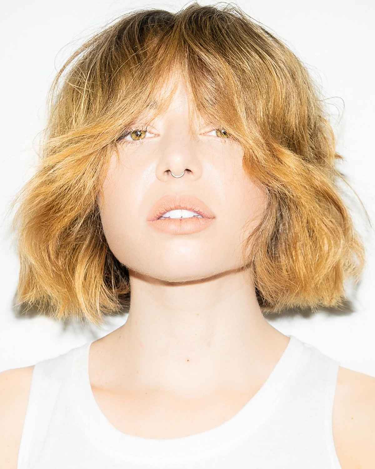 Low-Maintenance bob with middle part bangs hairstyle