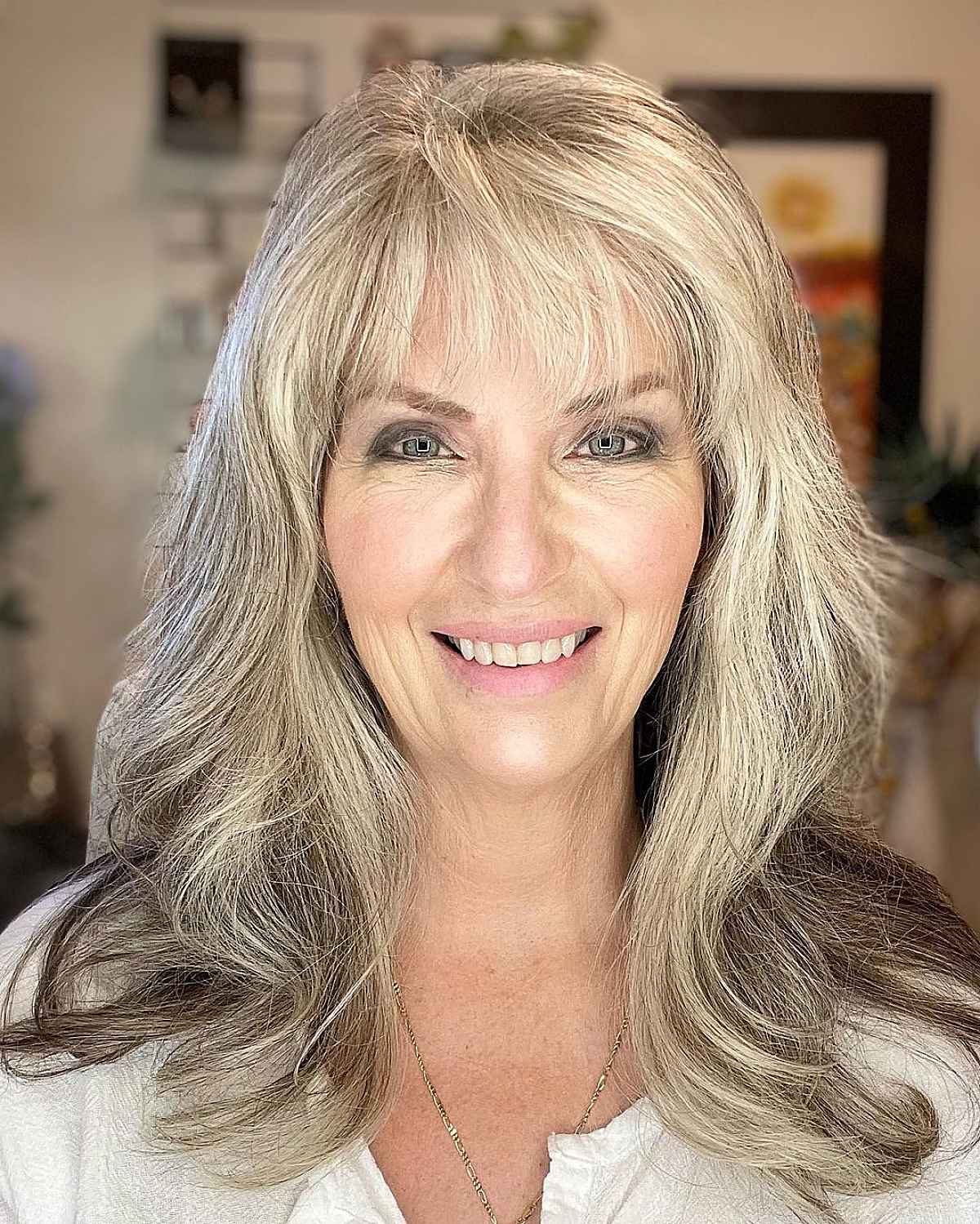 Collarbone-Length Hair with Wispy Bangs for ladies passed their sixties