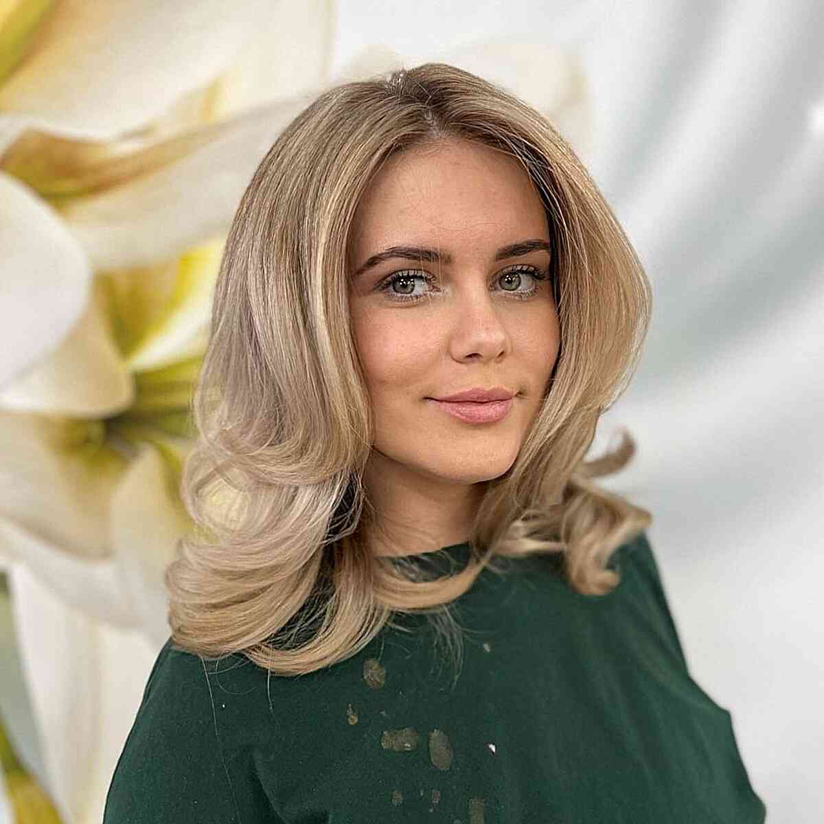 Cool Collarbone-Length Blonde Hair for women with a middle part and no bangs