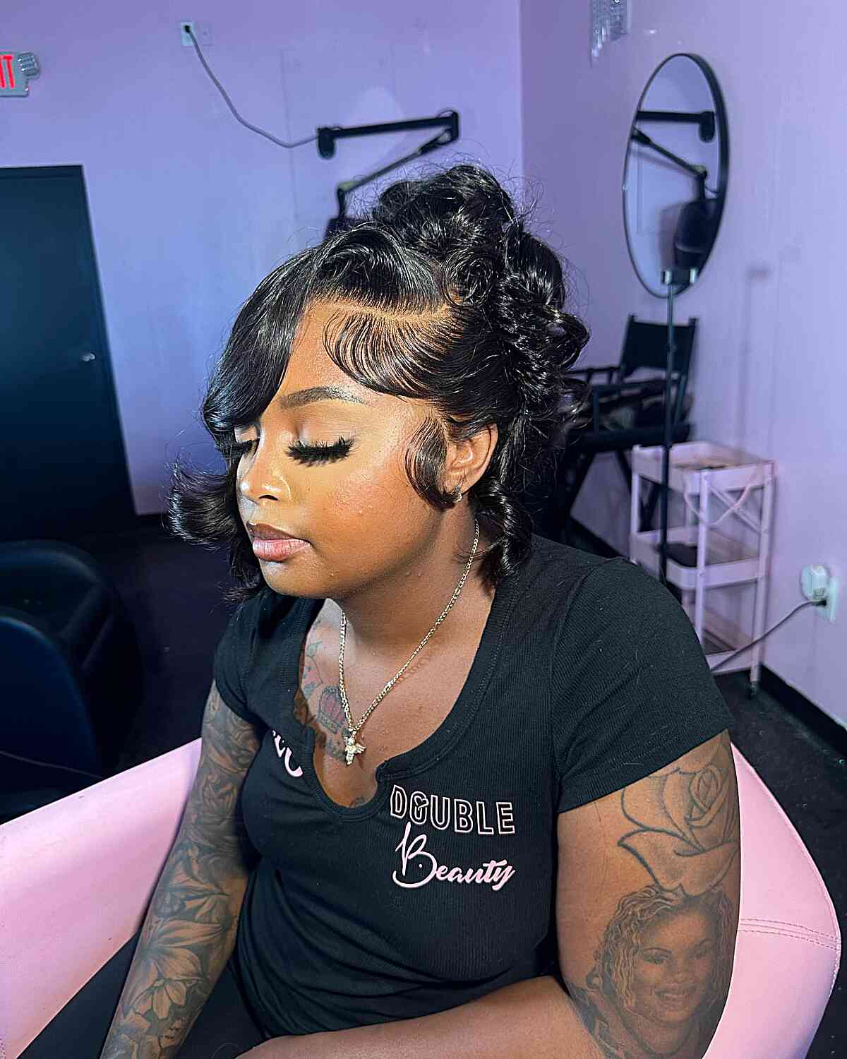 Curled Weave Updo with Side-Swept Hair for Black Women