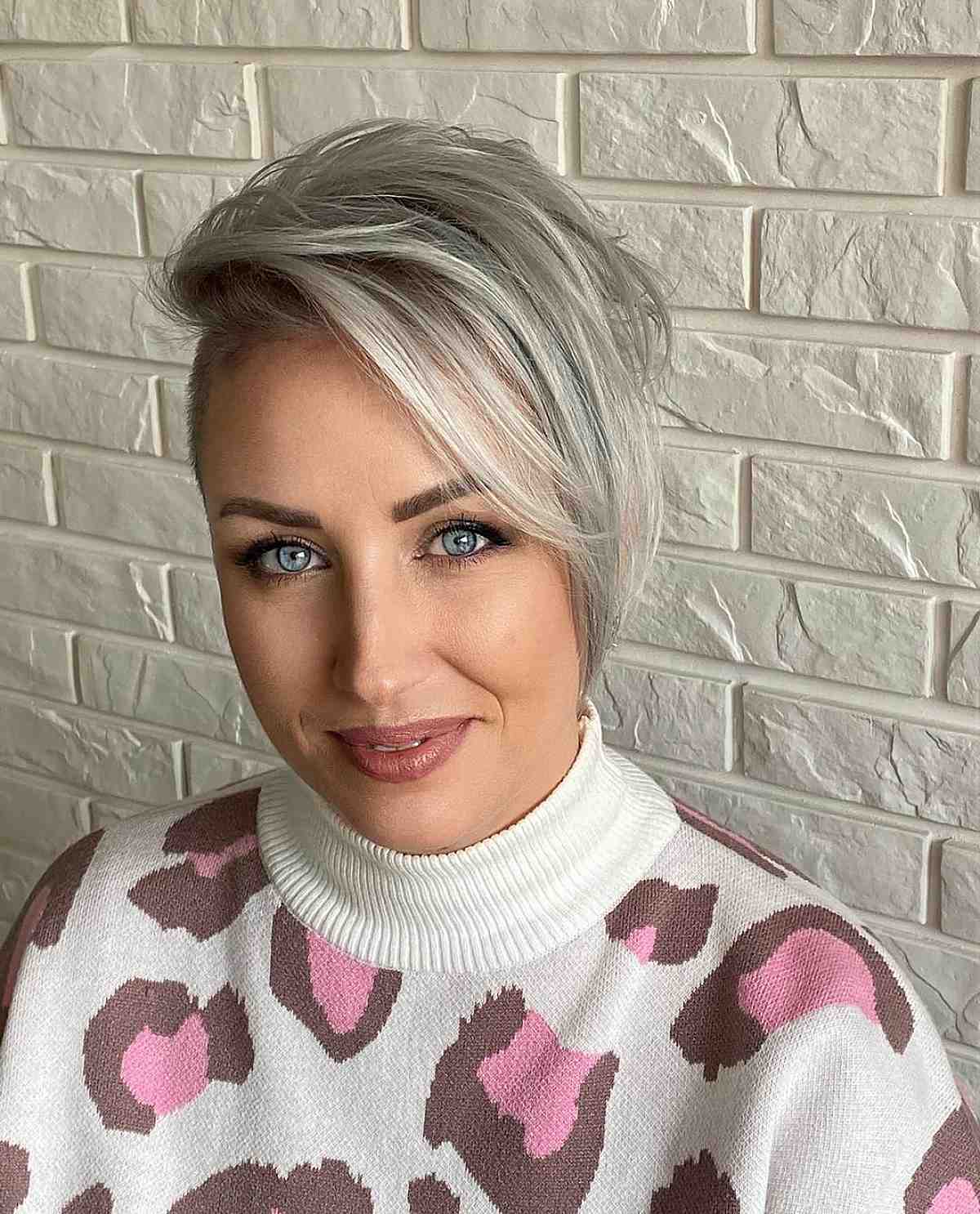 edgy short silver pixie with an undercut