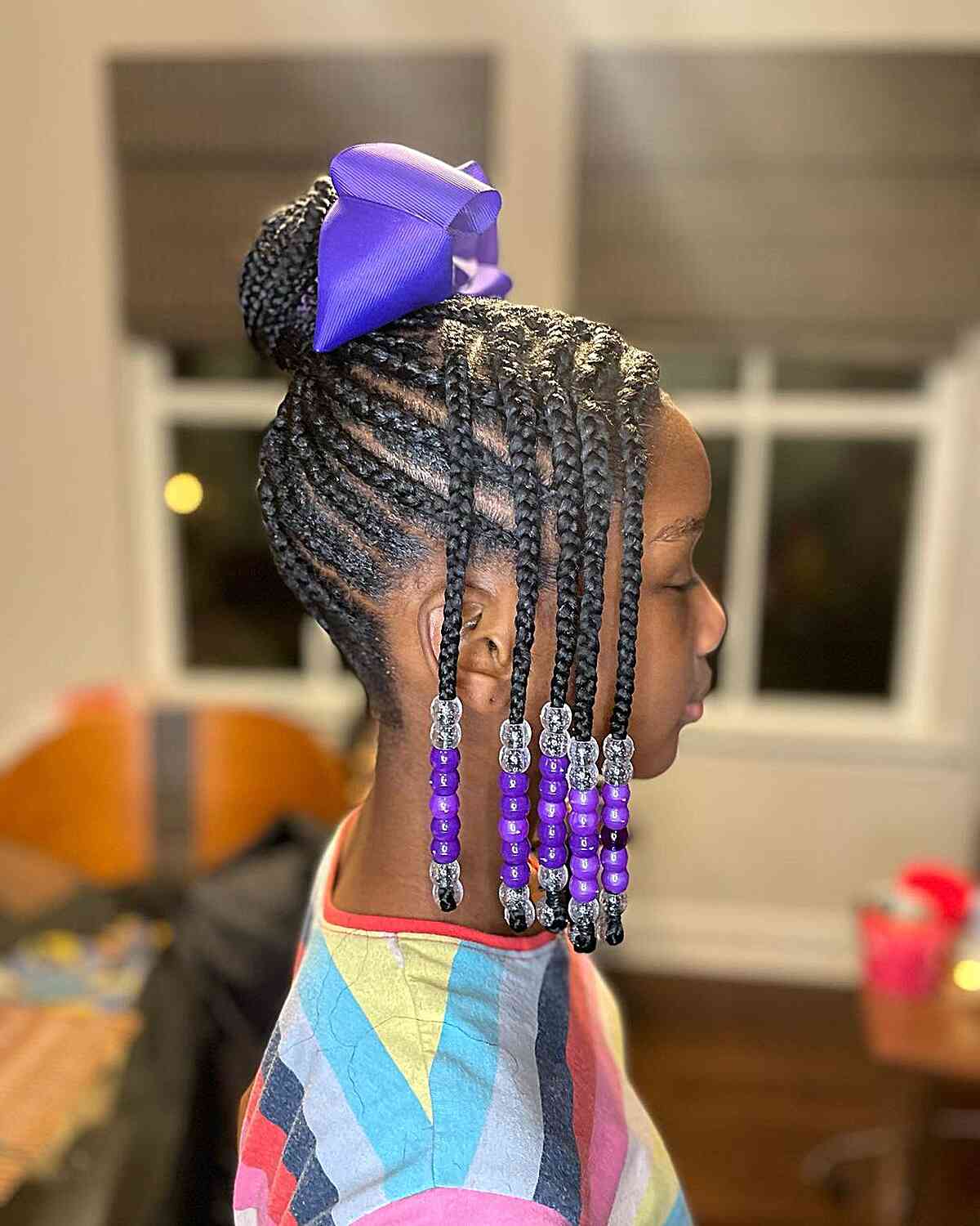 Feed-in Braids in a Bun with Purple Beads and Bow for Little Black Girls