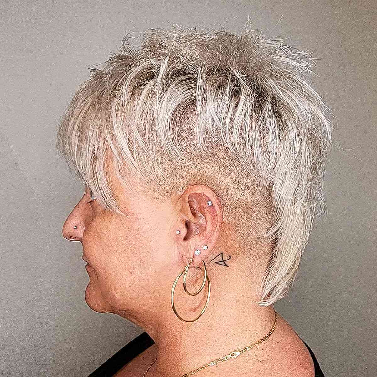 Get noticed faux hawk hairstyle for women