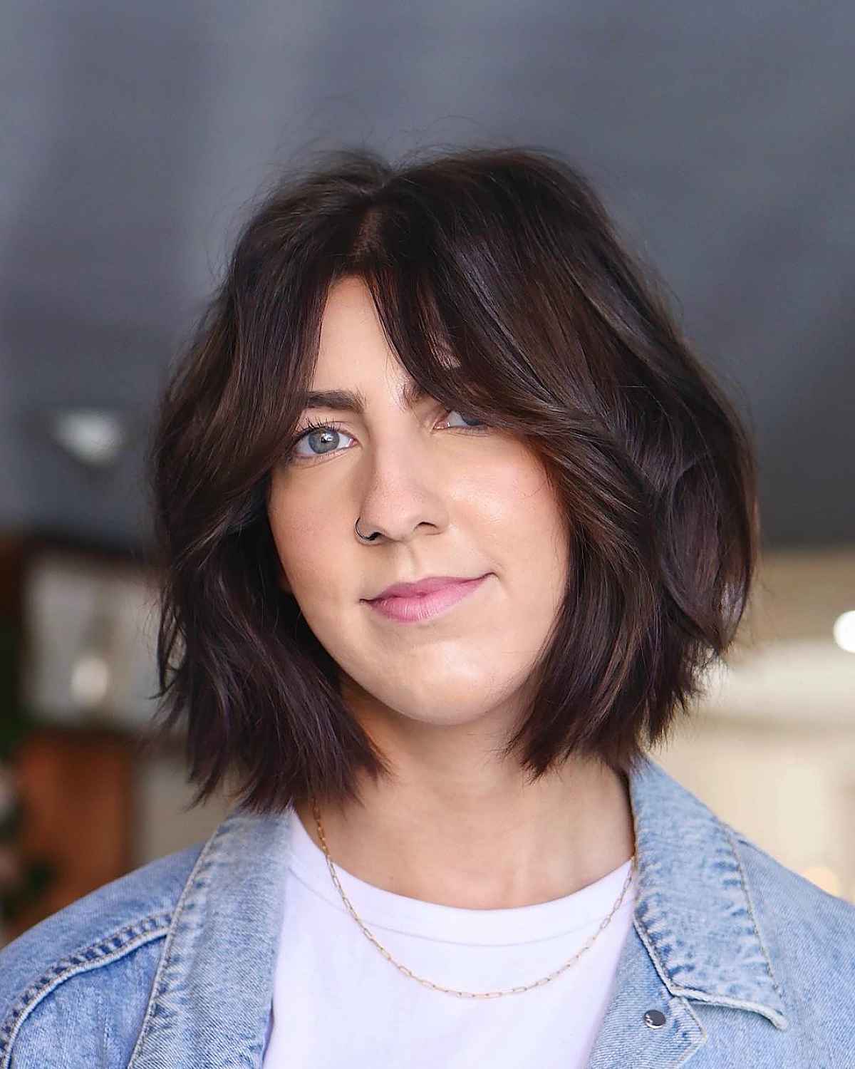 Stylish lob cut with curtain bangs hairstyle