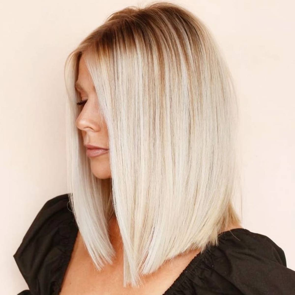 Lob on straight blonde hair with dark roots