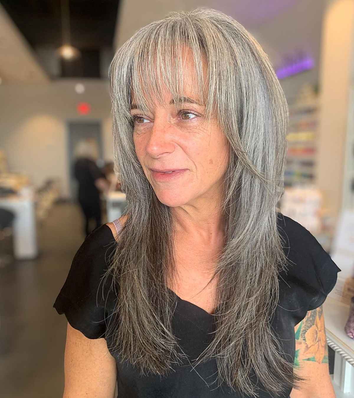 Long Shaggy Hair with Long Bangs for ladies in their 60s