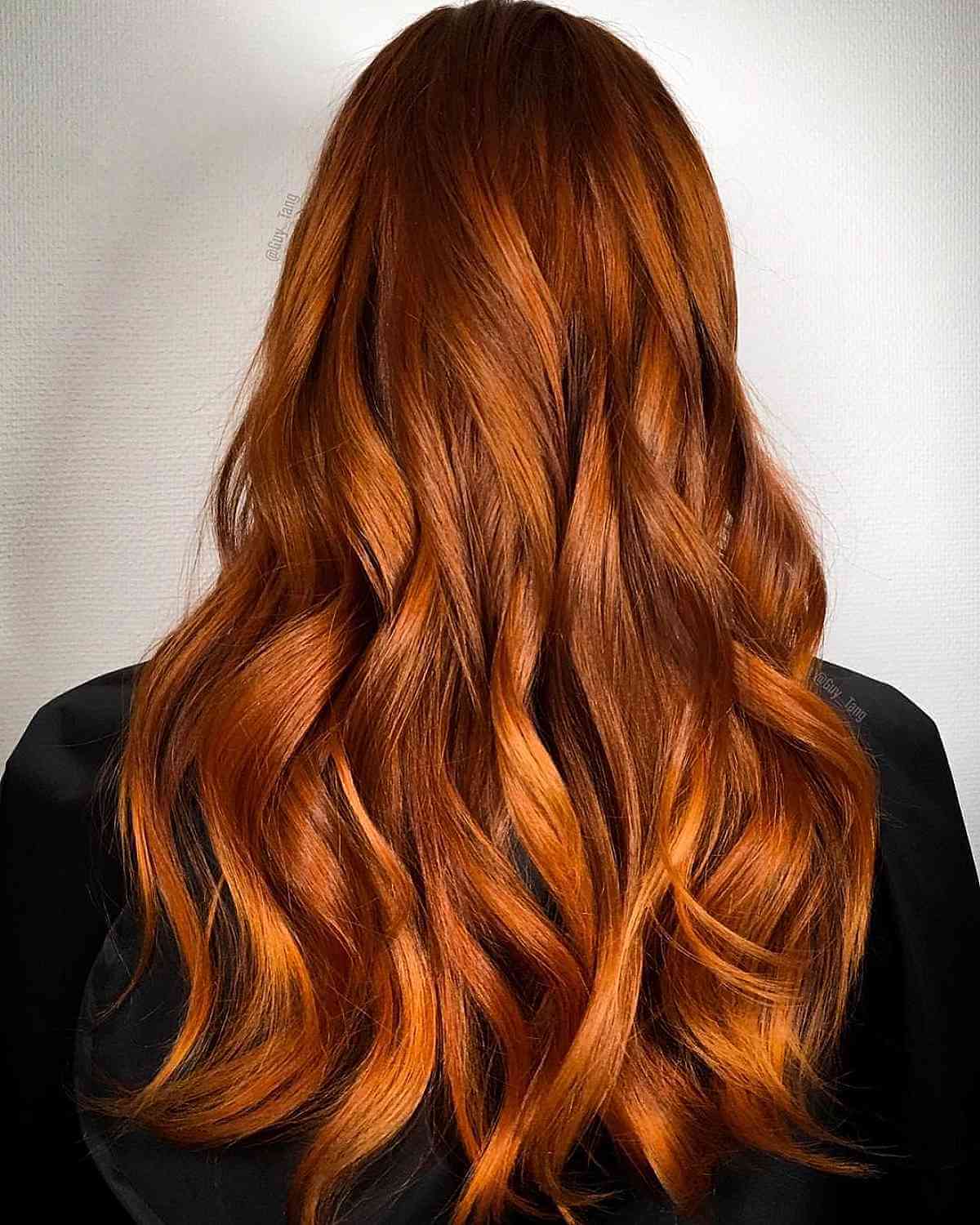 Rich and Glossy Long Reddish-Orange Hair
