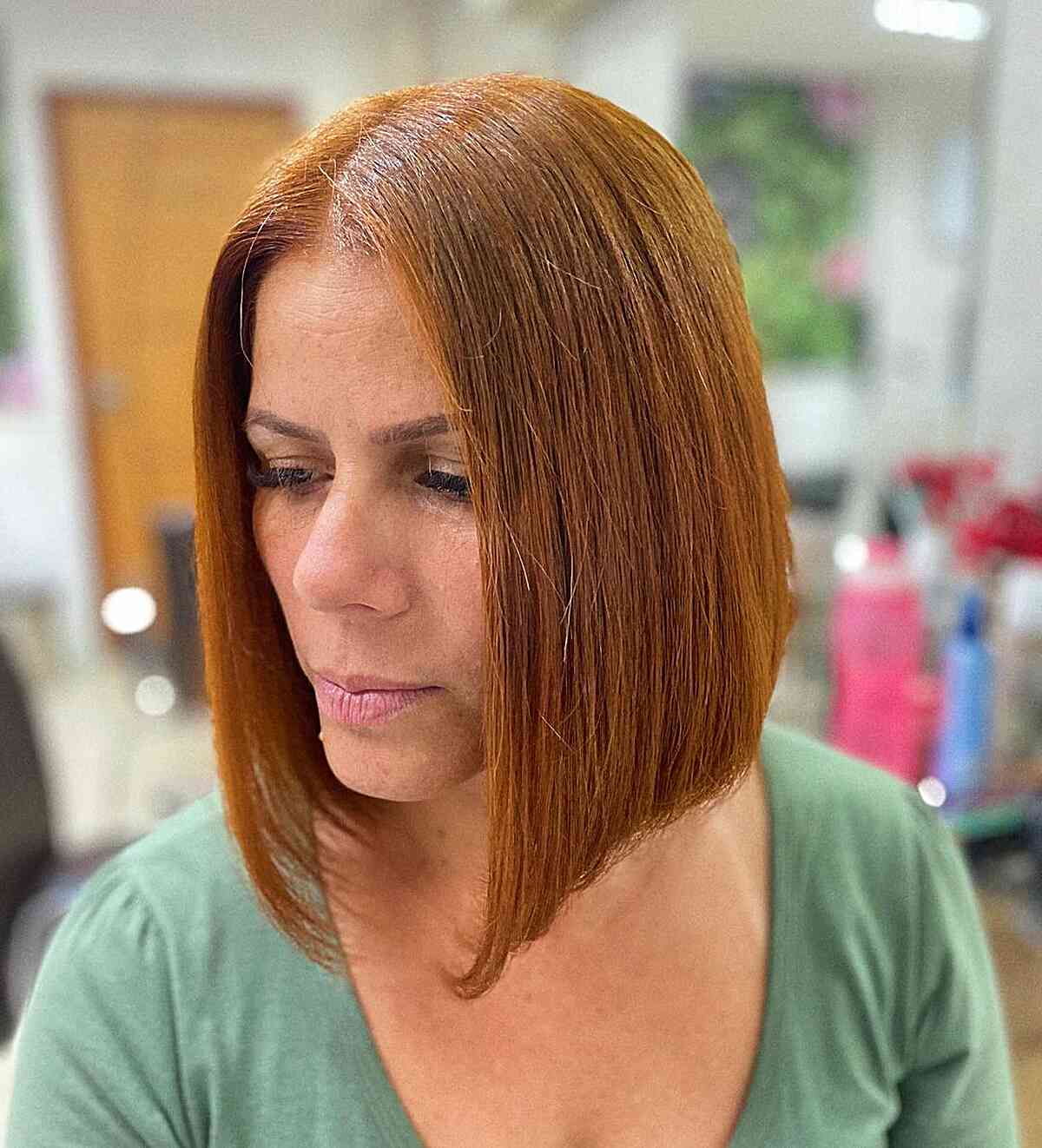 Shoulder-Length Bob with a Middle Part for Oval Faces