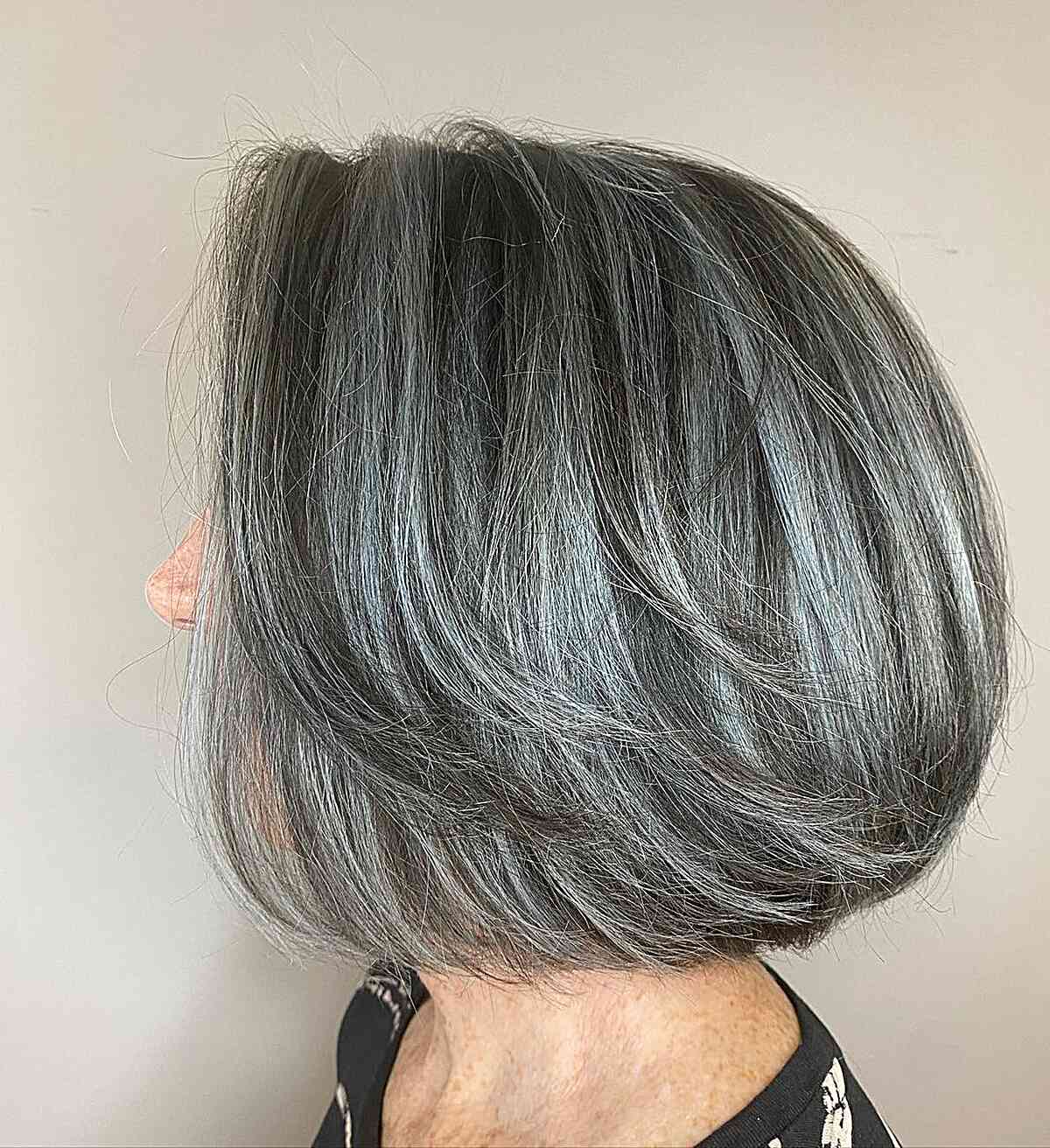 Silver-Gray Highlights on Old Ladies Shorter Dark Hair