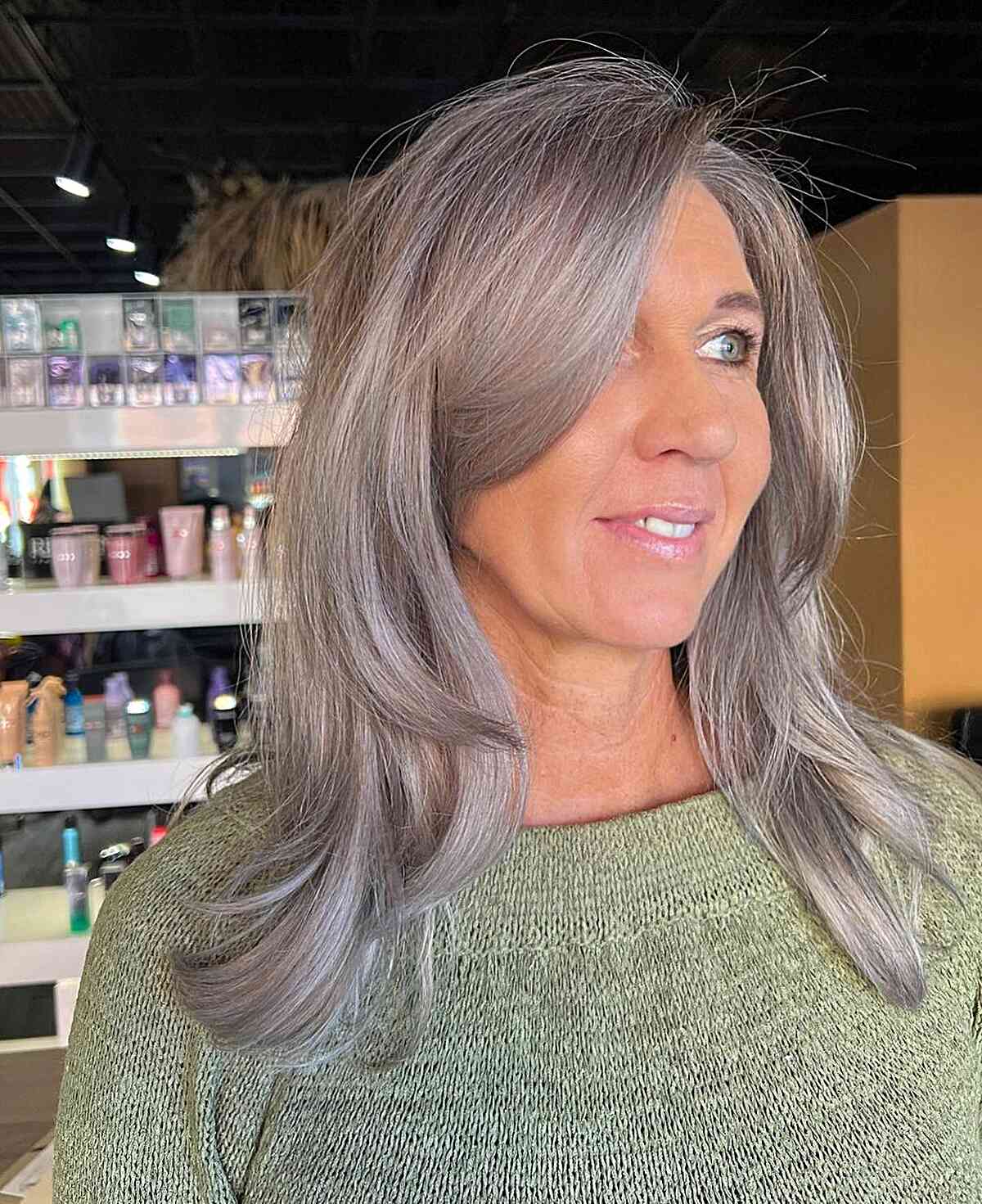 Mid-length Silver Layered Hair with Muted Purple Undertone for Old Women
