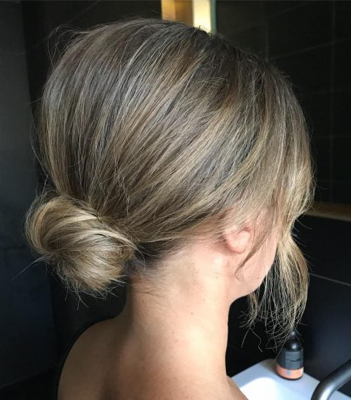 Picture of simple airy textured bun formal easy updo