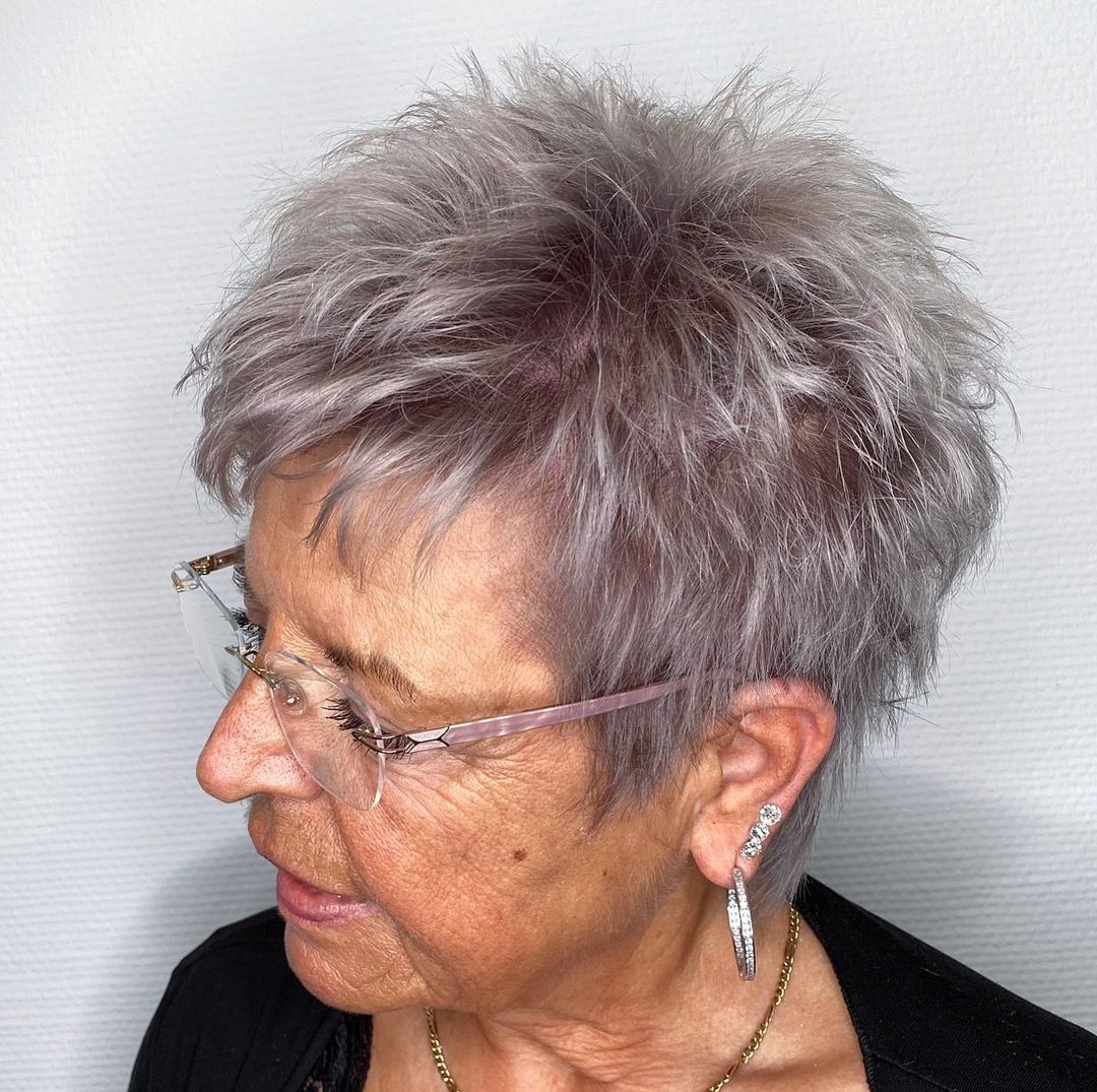Woman in her 70s with a spiky pixie cut